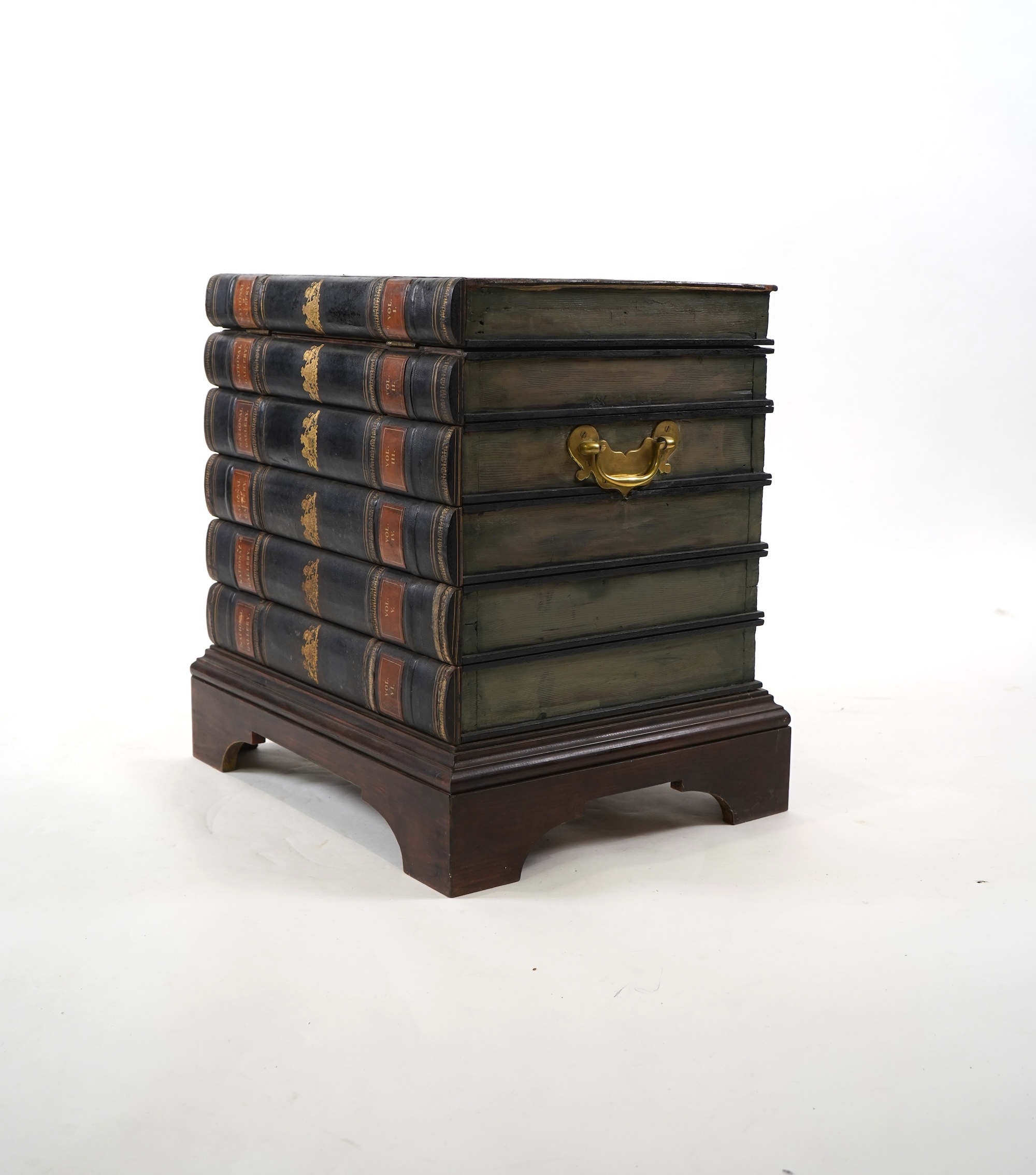 A Victorian style cellarette modelled as a stack of antiquarian books